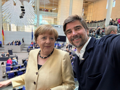 Boris Herrmann und Angela Merkel